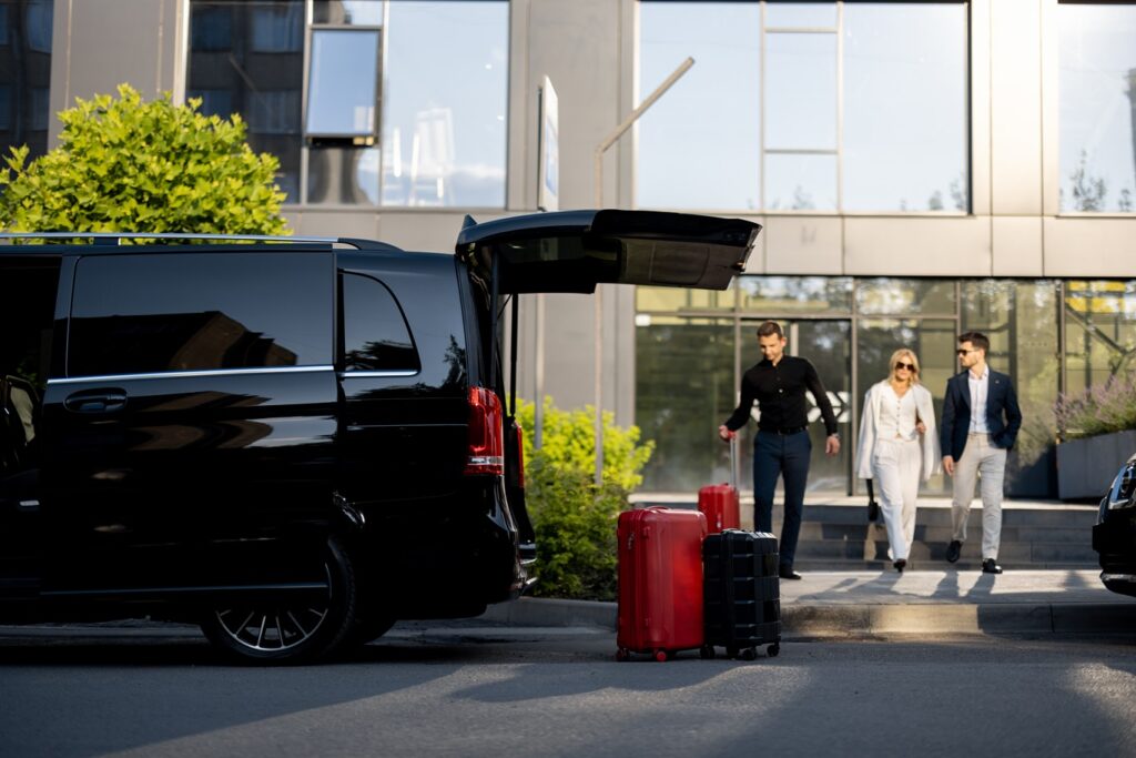 driver picking up travelers at the airport